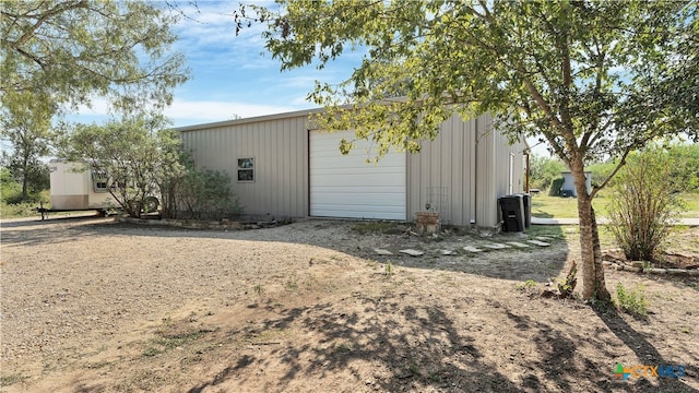 view of outdoor structure featuring a garage