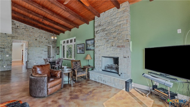 living room featuring high vaulted ceiling, concrete flooring, a stone fireplace, and wooden ceiling