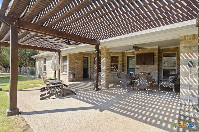 view of patio featuring a pergola and ceiling fan