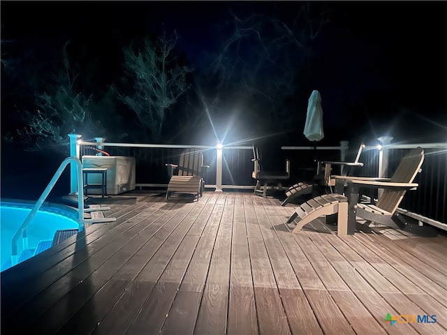 view of deck at night