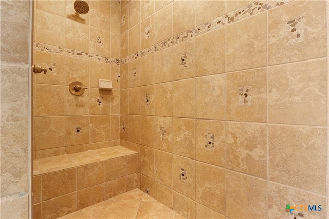 details featuring tiled shower