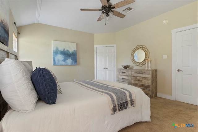 bedroom with carpet floors, ceiling fan, and lofted ceiling