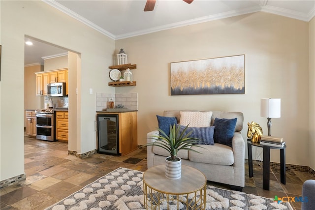 living room with ceiling fan, beverage cooler, and ornamental molding