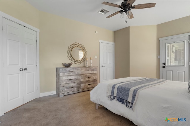 carpeted bedroom with ceiling fan