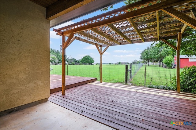 wooden deck with a pergola and a lawn