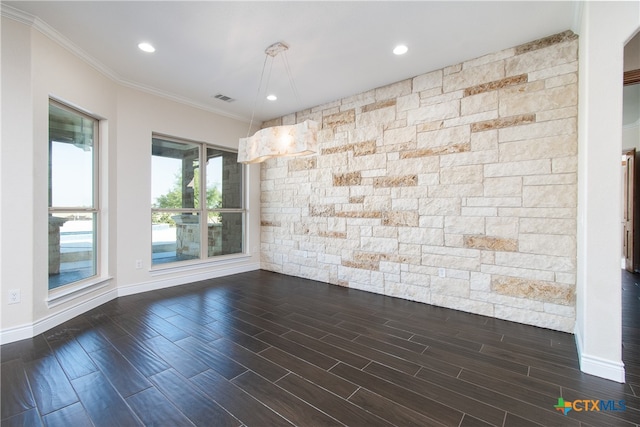 unfurnished room with dark wood-type flooring and crown molding