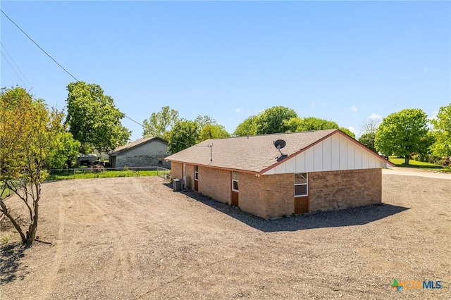 3453 Briana Dr, Belton, TX 76513 - view of side of home featuring brick siding and fence