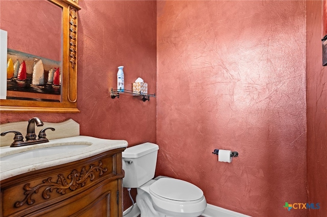 half bath with toilet and vanity