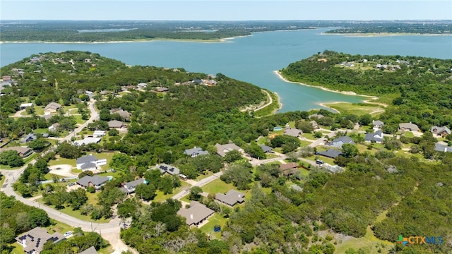 aerial view of residential area with a large body of water