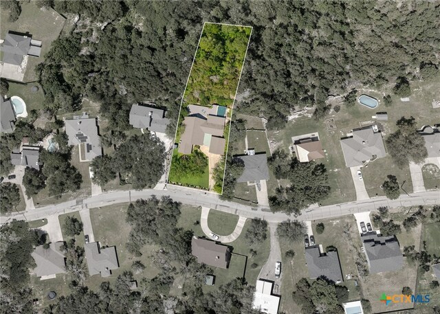 aerial view of residential area featuring property boundaries highlighted