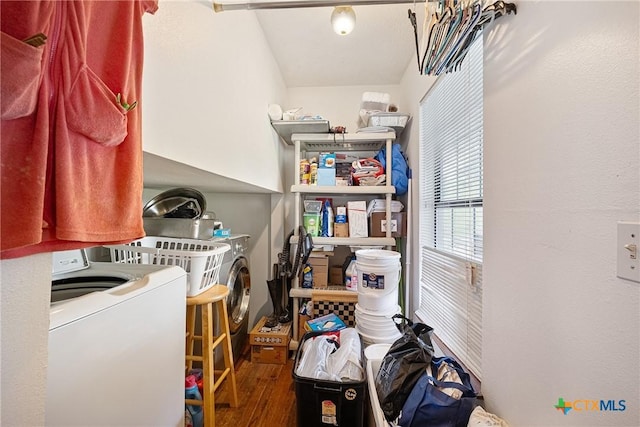 laundry room with wood finished floors and washing machine and clothes dryer