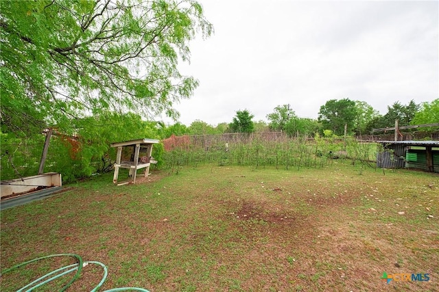 view of yard featuring fence
