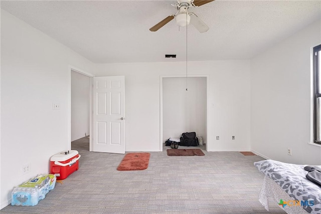 bedroom featuring carpet, ceiling fan, and baseboards