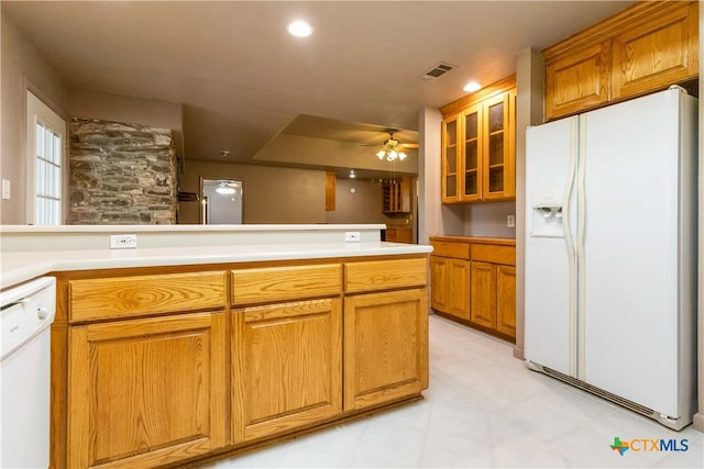 kitchen with white appliances and ceiling fan