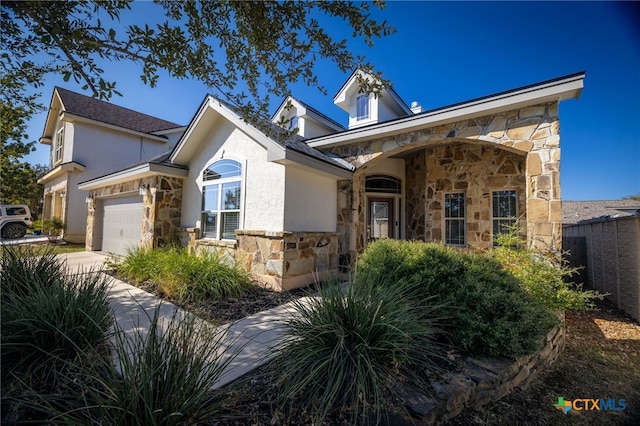 view of front of property featuring a garage