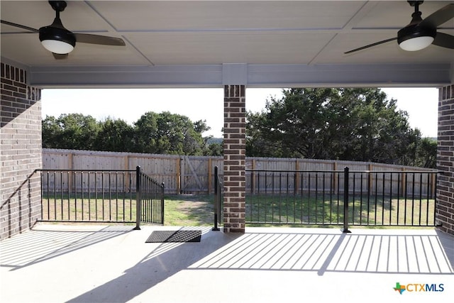 view of patio with a ceiling fan and a fenced backyard