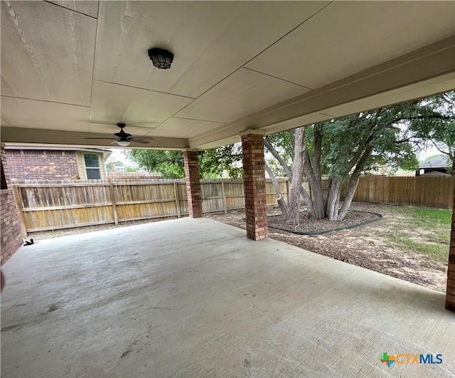 view of patio featuring a fenced backyard and ceiling fan