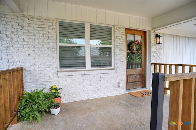 416 S Welhausen Ave, Shiner, TX 77984 - property entrance with brick siding