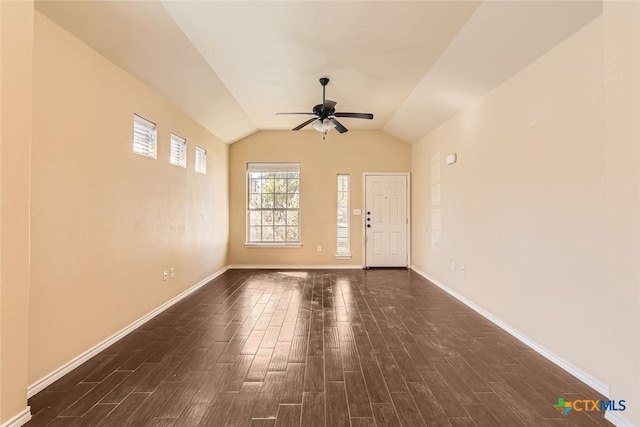 unfurnished room with ceiling fan and vaulted ceiling