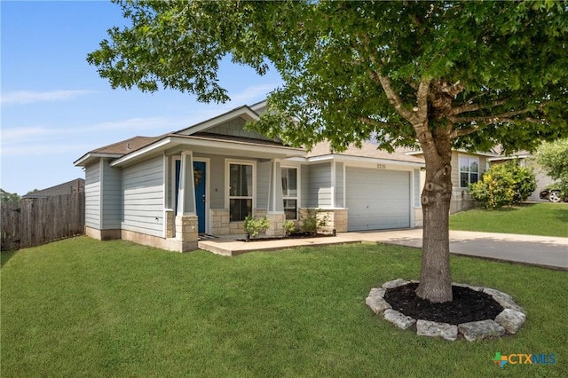 2215 Bellmont, Temple, TX 76504 - single story home featuring a garage, concrete driveway, and stone siding