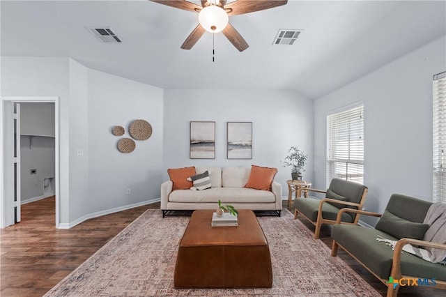 2215 Bellmont, Temple, TX 76504 - living room featuring wood finished floors, a ceiling fan, and baseboards