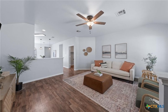 2215 Bellmont, Temple, TX 76504 - living room featuring a ceiling fan, dark wood-type flooring, baseboards, and recessed lighting