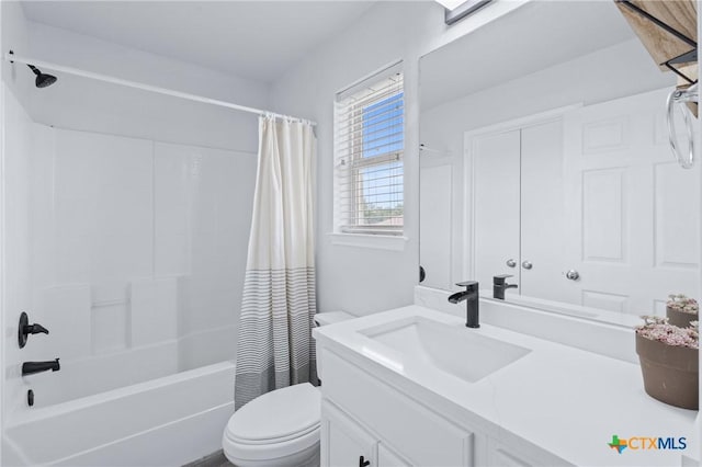 2215 Bellmont, Temple, TX 76504 - full bathroom with toilet, vanity, and shower / bath combo with shower curtain