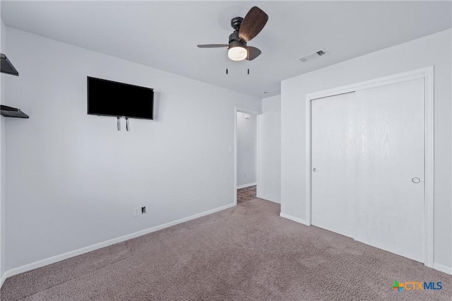 2215 Bellmont, Temple, TX 76504 - unfurnished bedroom featuring carpet, baseboards, a closet, and a ceiling fan