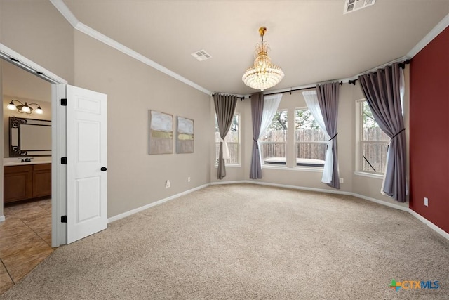 2303 Erica Kaitlin Ln, Cedar Park, TX 78613 - spare room with light colored carpet, ornamental molding, a chandelier, and baseboards
