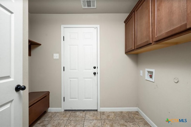 2303 Erica Kaitlin Ln, Cedar Park, TX 78613 - washroom featuring hookup for a washing machine, cabinet space, baseboards, and light tile patterned floors