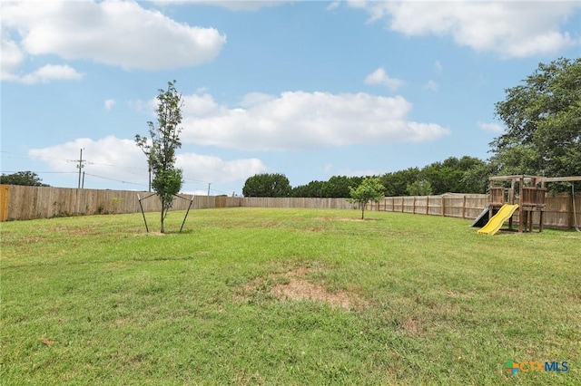 308 Cypress Springs Dr, Belton, TX 76513 - fenced backyard featuring a playground