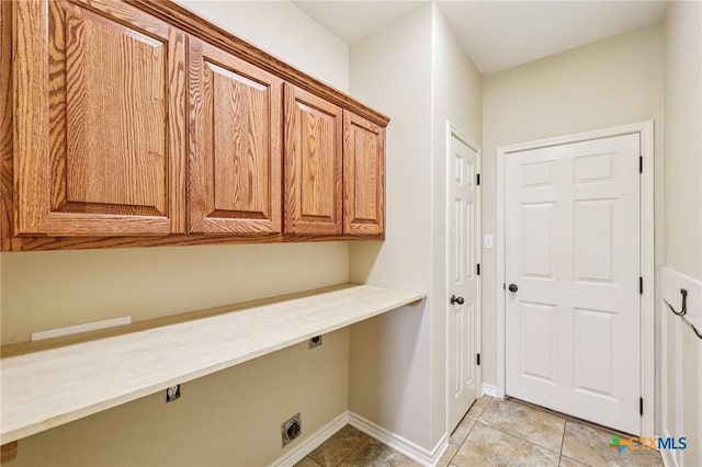 308 Cypress Springs Dr, Belton, TX 76513 - washroom featuring hookup for an electric dryer, cabinet space, light tile patterned floors, and an office area