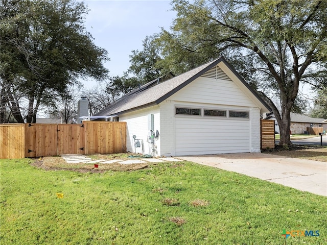 detached garage with fence