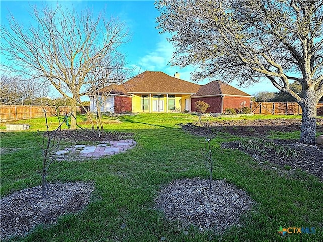 view of yard with fence