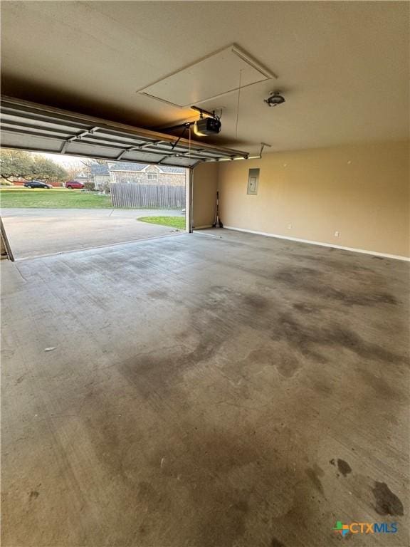 garage featuring a garage door opener