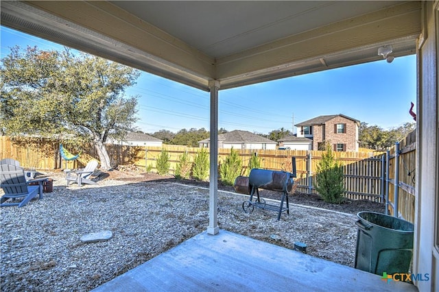 view of patio / terrace featuring area for grilling and a fenced backyard