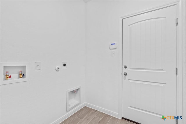 laundry area with electric dryer hookup, gas dryer hookup, and hookup for a washing machine