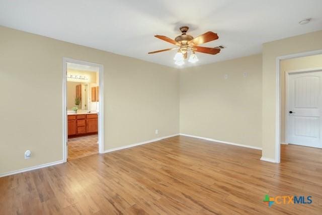 250 Val Verde Dr, New Braunfels, TX 78130 - empty room with ceiling fan and light wood finished floors