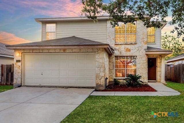 250 Val Verde Dr, New Braunfels, TX 78130 - traditional-style home with stone siding, concrete driveway, and an attached garage