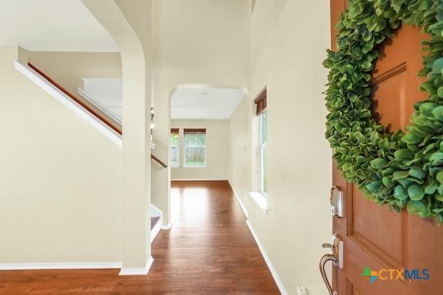 250 Val Verde Dr, New Braunfels, TX 78130 - entrance foyer featuring stairs, wood finished floors, and arched walkways