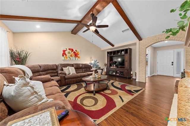 living room with lofted ceiling with beams, ceiling fan, and dark hardwood / wood-style flooring