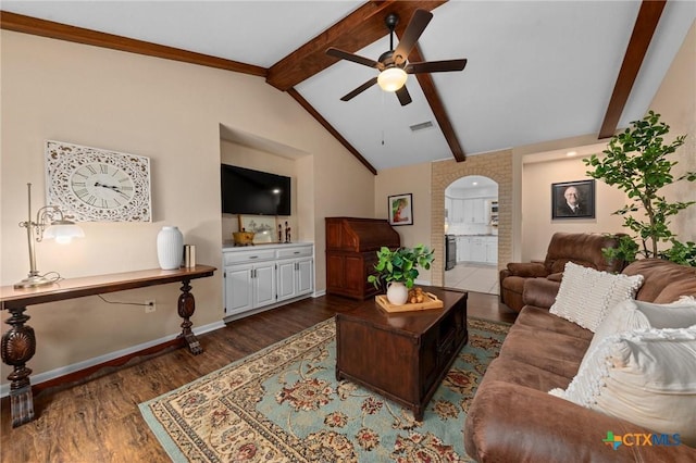 living room featuring vaulted ceiling with beams, dark wood-type flooring, and ceiling fan