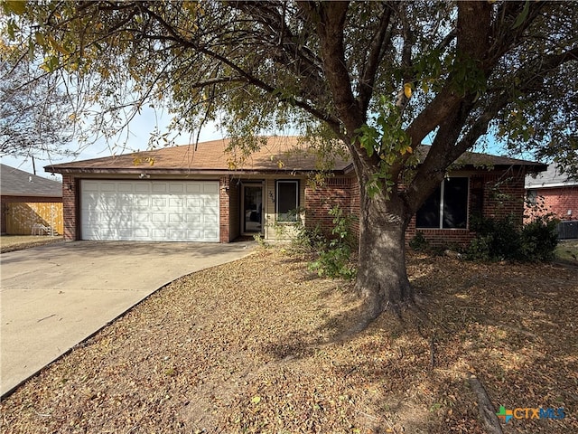 single story home featuring a garage