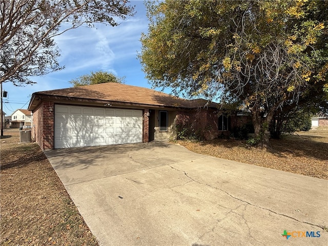 ranch-style home with a garage