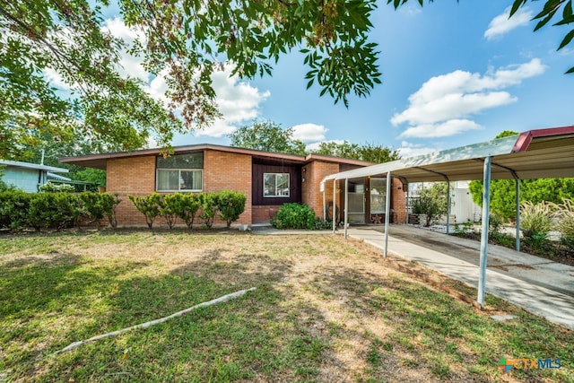 ranch-style house with a front yard