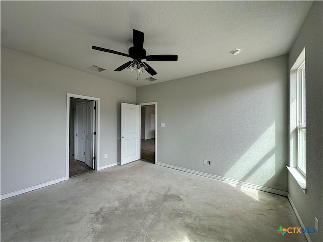 2571 Cedar Glen Dr, Belton, TX 76513 - unfurnished bedroom with unfinished concrete flooring and a ceiling fan