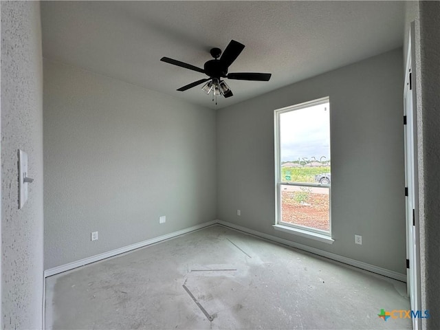 2571 Cedar Glen Dr, Belton, TX 76513 - empty room featuring a ceiling fan and unfinished concrete flooring
