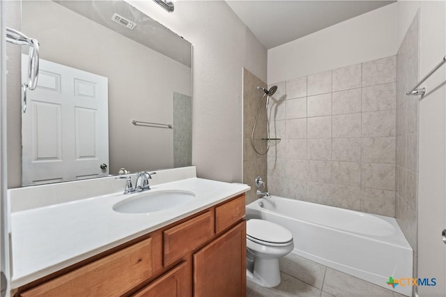 bathroom featuring visible vents, bathing tub / shower combination, toilet, tile patterned flooring, and vanity