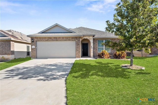 ranch-style house featuring brick siding, roof with shingles, concrete driveway, a garage, and a front lawn