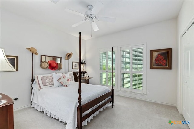 13650 Blackberry Rd, Salado, TX 76571 - bedroom featuring light carpet, ceiling fan, and a closet